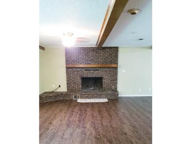 Nestled on a beautifully wooded and landscaped double lot, this - photo 4