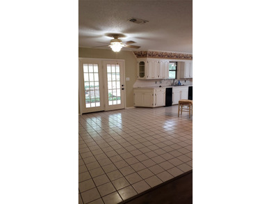 Nestled on a beautifully wooded and landscaped double lot, this - photo 5