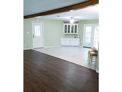 Nestled on a beautifully wooded and landscaped double lot, this - photo 6