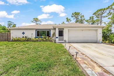 Tucked away in Tropical Gulf Acres is this 3-4 bedroom 2 bath - photo 1