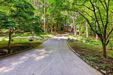 Tucked beneath a private wooded canopy in Oak Ridge's Riverbend - photo 2