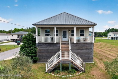 Beautiful coastal beach home just moments from the water - photo 1