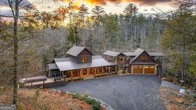 Set on 8.5 pristine acres, this extraordinary custom-built cabin
