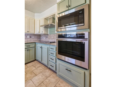 Step inside to discover a thoughtfully remodeled kitchen - photo 14