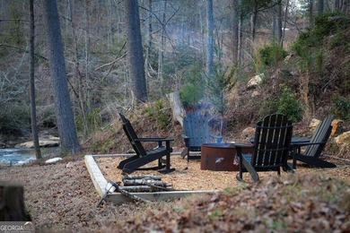 Set on 8.5 pristine acres, this extraordinary custom-built cabin