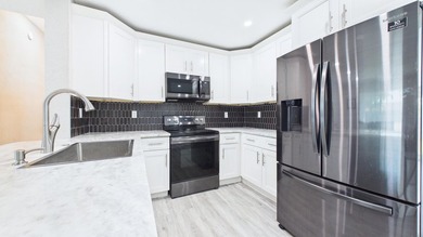 Welcome home to this beautifully remodeled 3BR/2BA residence - photo 6