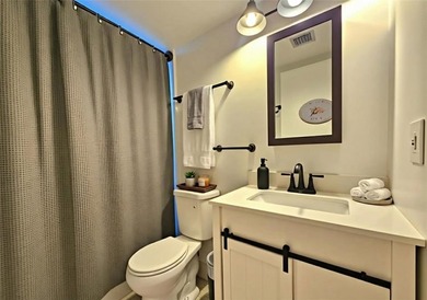 Welcome to this charming corner unit, 2 bed, 2 bath fully