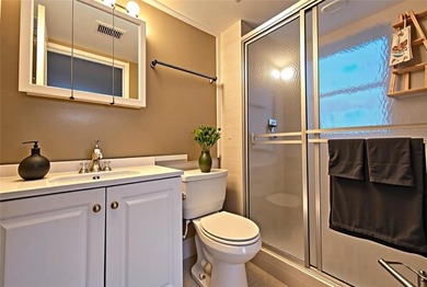 Welcome to this charming corner unit, 2 bed, 2 bath fully