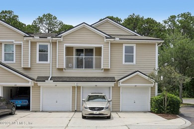 Beautifully maintained end-unit condo in the gated community of - photo 1