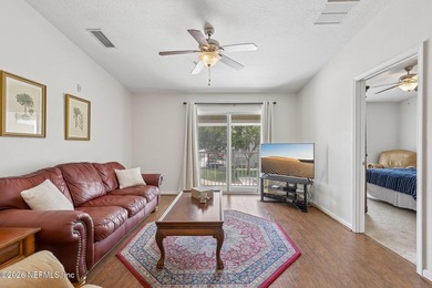Beautifully maintained end-unit condo in the gated community of - photo 5