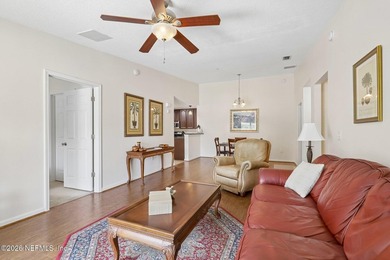 Beautifully maintained end-unit condo in the gated community of - photo 6