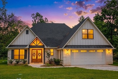 Welcome to your brand-new home in the gated Hideaway Lake - photo 1