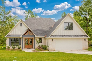 Welcome to your brand-new home in the gated Hideaway Lake - photo 2