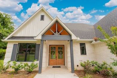 Welcome to your brand-new home in the gated Hideaway Lake - photo 3