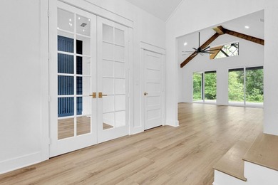 Welcome to your brand-new home in the gated Hideaway Lake - photo 5