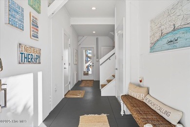 Discover the magic of refined coastal luxury at 148 Via Old