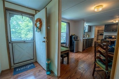 Welcome to your lakeside escape! This cozy, well-maintained - photo 7