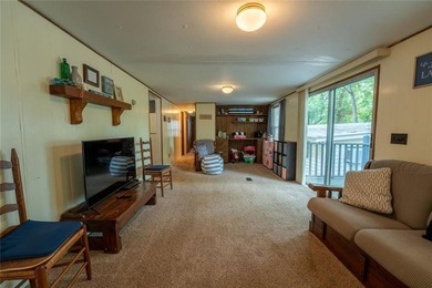 Welcome to your lakeside escape! This cozy, well-maintained - photo 10