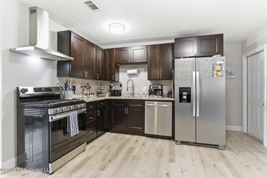 This adorable home in North Gulfport offers it all, with easy - photo 8