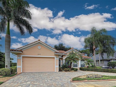 Virtually Staged. Exquisite renovated home nestled in the gated - photo 5