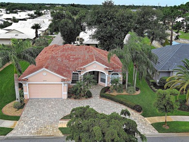 Virtually Staged. Exquisite renovated home nestled in the gated - photo 8