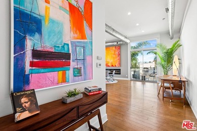 Light and bright loft style corner unit with 2 full bathrooms in - photo 2