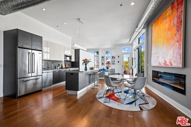 Light and bright loft style corner unit with 2 full bathrooms in - photo 3