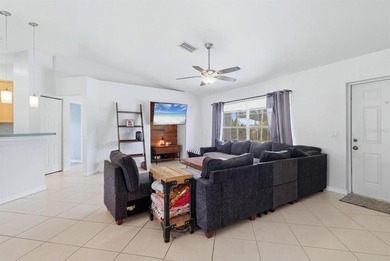 Welcome home to 3265 Quarter Street in North Port, Florida! This - photo 4