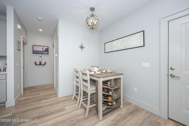 WELCOME HOME to easy coastal living in the highly sought after - photo 4