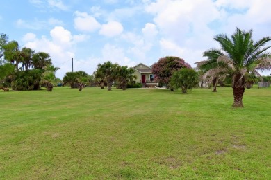 Nestled in the peaceful Copano Cove area, this charming