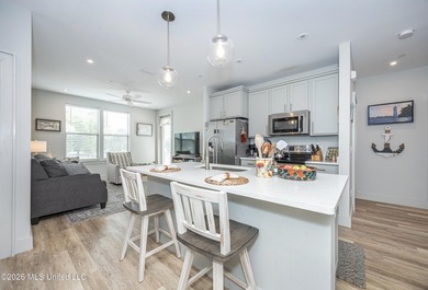 WELCOME HOME to easy coastal living in the highly sought after - photo 6