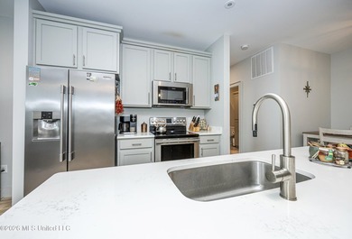 WELCOME HOME to easy coastal living in the highly sought after - photo 7