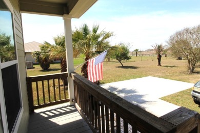 Nestled in the peaceful Copano Cove area, this charming