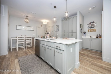 WELCOME HOME to easy coastal living in the highly sought after - photo 10