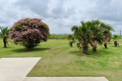 Nestled in the peaceful Copano Cove area, this charming