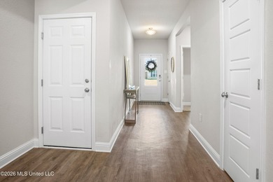 Welcome to this inviting home, where comfort meets thoughtful - photo 2