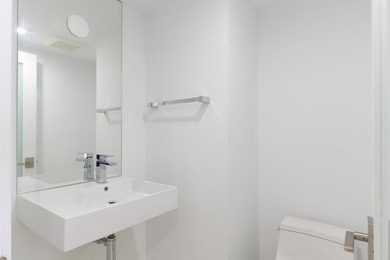 Sleek, modern and luxuriously fully renovated unit. Three - photo 11