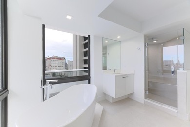 Sleek, modern and luxuriously fully renovated unit. Three - photo 14