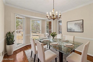 Welcome to this spacious 4-sided brick home with painted cedar