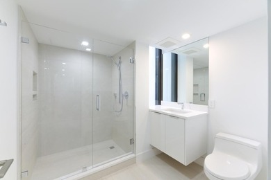Sleek, modern and luxuriously fully renovated unit. Three - photo 17