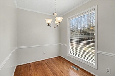 Welcome to this spacious 4-sided brick home with painted cedar