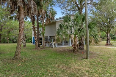 Tucked away at the end of a quiet private road, this elevated - photo 50