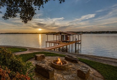 Positioned on open water, this lakefront home delivers a rare - photo 1