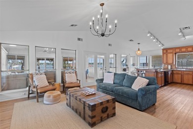 Positioned on open water, this lakefront home delivers a rare - photo 9