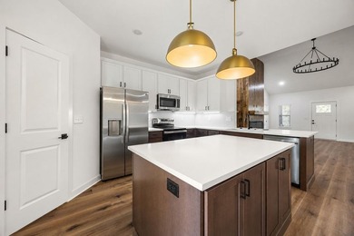*Agent Owned* New Construction with refrigerator, gutters, and - photo 6