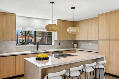 Walk to the beach from this stunning designer-renovated Miami - photo 5