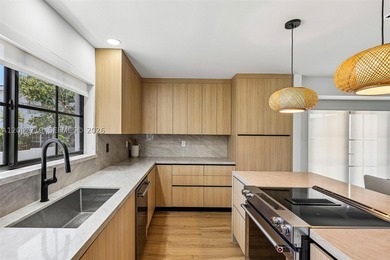Walk to the beach from this stunning designer-renovated Miami - photo 8