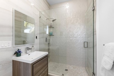 Situated on a premium lot in East Delray's La Hacienda, this - photo 35