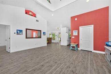 Welcome to this distinctive Key West-style home located in the - photo 6
