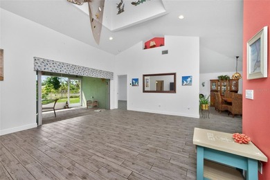Welcome to this distinctive Key West-style home located in the - photo 8